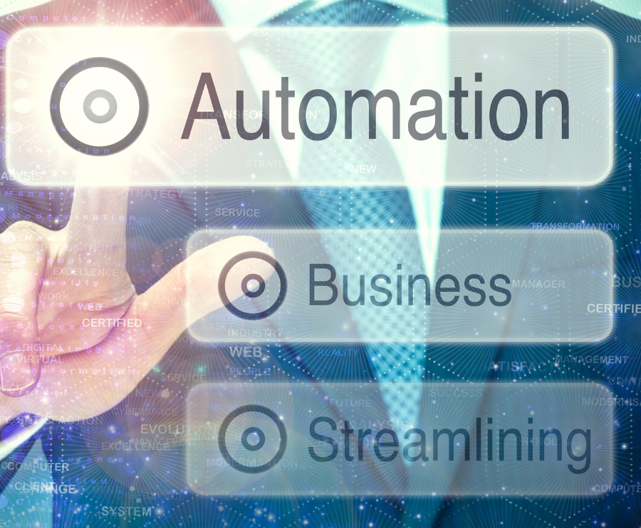 a man touches an automation button on a screen with the words business and streamlining also on the screen